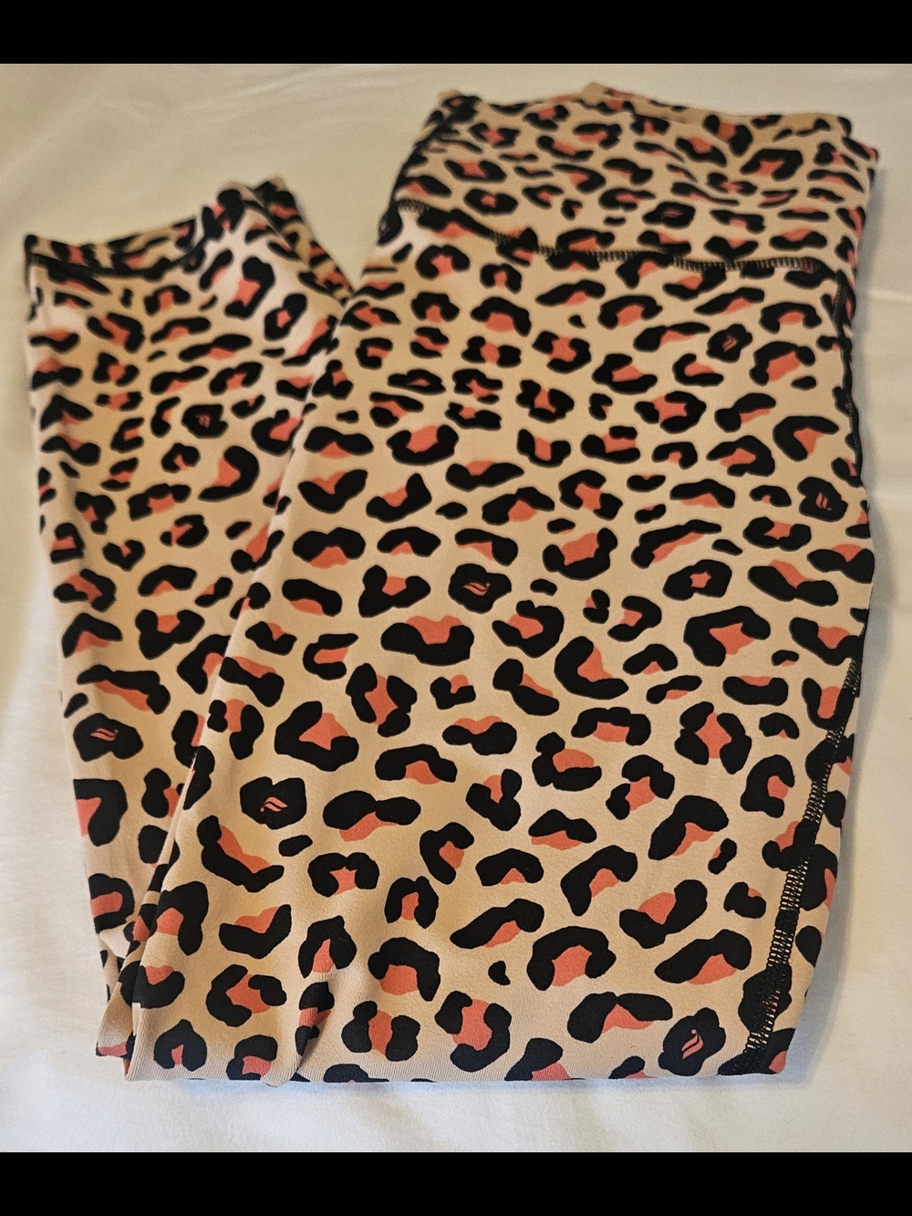 Fabletics PowerHold Leopard Print Leggings in Cream, Black & Orange - Picture 1 of 8